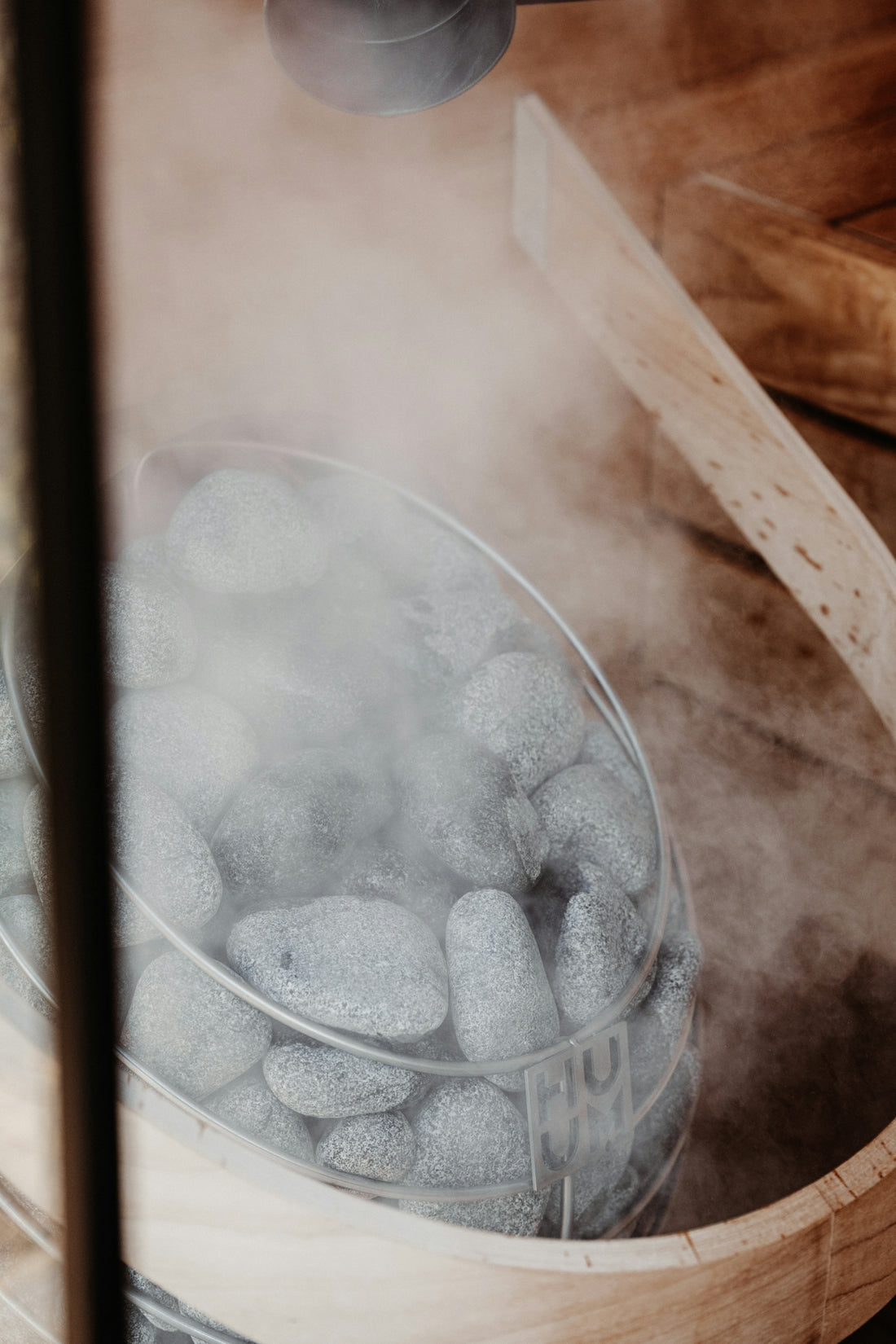 Steaming rocks inside a sauna.