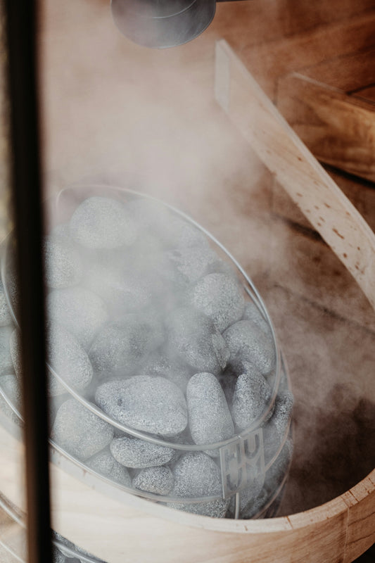 Steaming rocks inside a sauna.